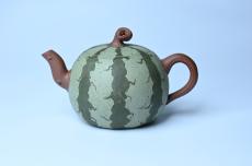 紫砂壶图片:美壶特惠 精致西瓜紫砂壶 茶人醉爱 - 美壶网