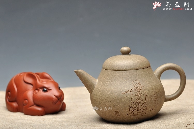 紫砂壶图片：全手老味高梨形 古拙之味 手中无梨式，难以言茗事 高寿与幽思 - 宜兴紫砂壶网