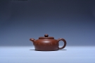 紫砂壶图片：新周盘 范荷手制乐人陶刻 - 宜兴紫砂壶网