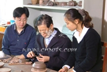 紫砂壶工艺师图片：鲍骧 - 美壶网