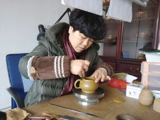 紫砂壶图片：全手工制壶过程-开口 - 美壶网