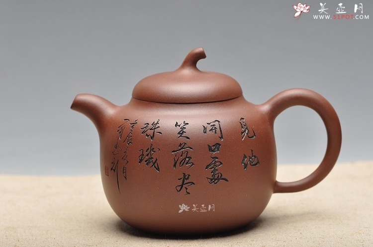 紫砂壶图片：传统实用之作  顾式茄段 舒展优美 - 美壶网