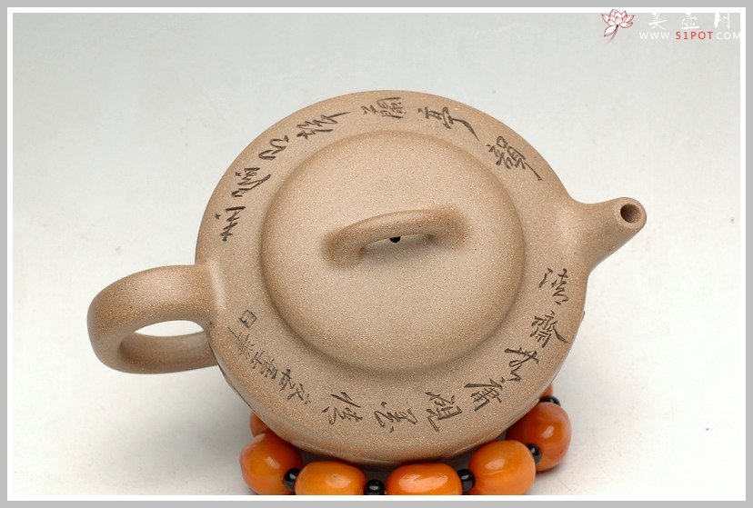 紫砂壶图片：婉约厚韵之莲影 - 美壶网