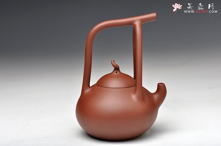紫砂壶图片：国助工强强联合 和石装饰 传统经典 全手瓢提梁 - 美壶网
