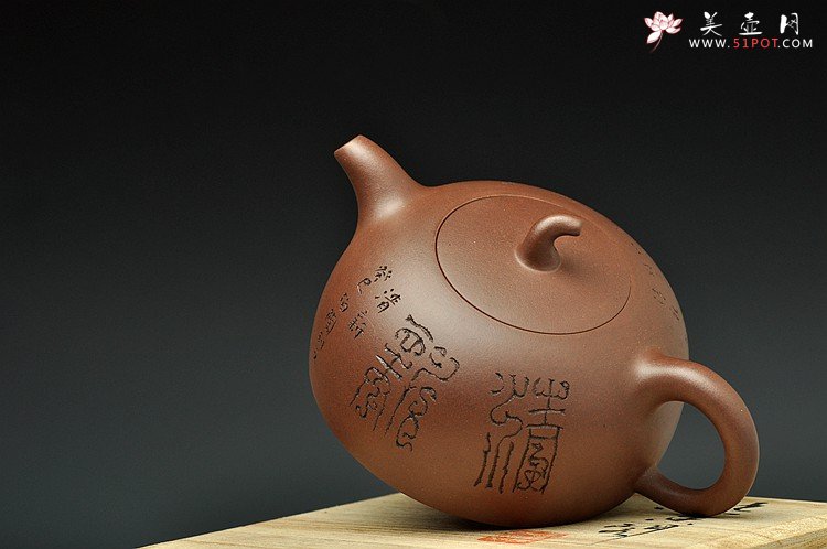 紫砂壶图片：简洁大方 圆润古朴 放生图 全手半瓜  - 美壶网
