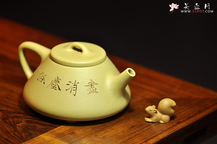 紫砂壶图片：素雅文气 骨格清奇 本山绿之兰花子冶石瓢 - 美壶网