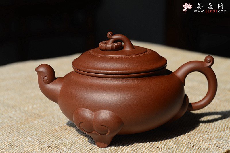 紫砂壶图片：沉稳大气 精美之作 动感十足  吉祥如意 - 美壶网