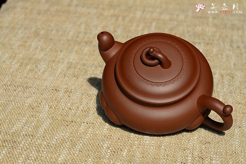 紫砂壶图片：沉稳大气 精美之作 动感十足  吉祥如意 - 美壶网