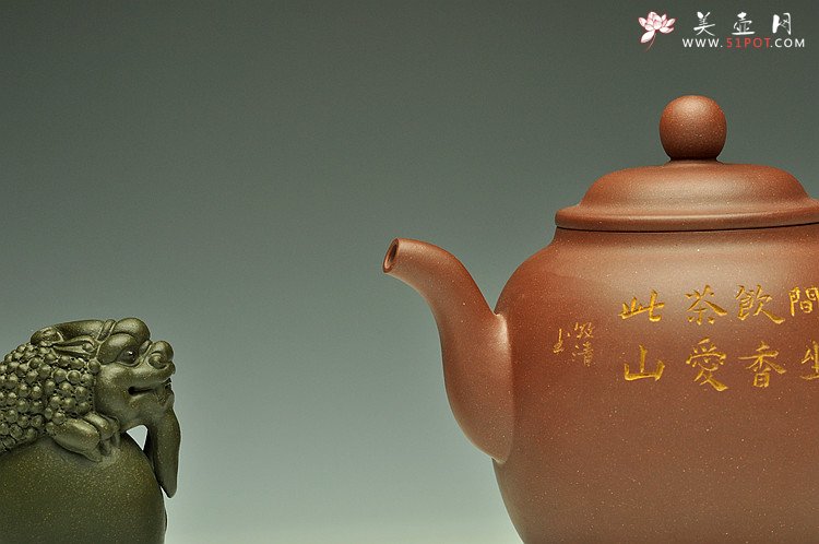 紫砂壶图片：造型简洁大方  刻绘生动逼真  全手明泉  - 美壶网