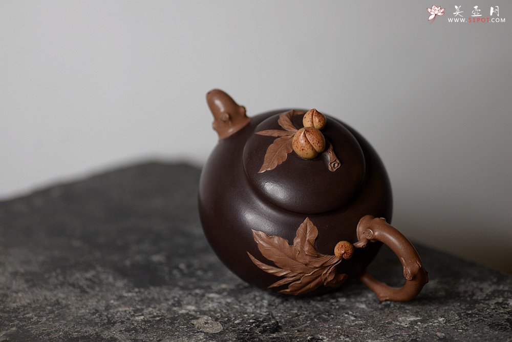 紫砂壶图片：原创作品 孙伟强张新亚合作 寿桃 饱满大气 贴叶精湛 - 美壶网