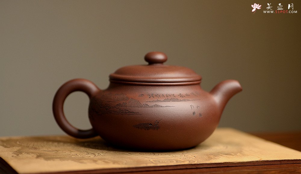 紫砂壶图片：稳重大气  大仿古 通转山水 - 美壶网
