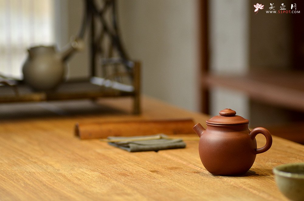 紫砂壶图片：美壶特惠 玩味巨轮 茶人最爱 实用 独孔加不锈钢滤网 - 美壶网