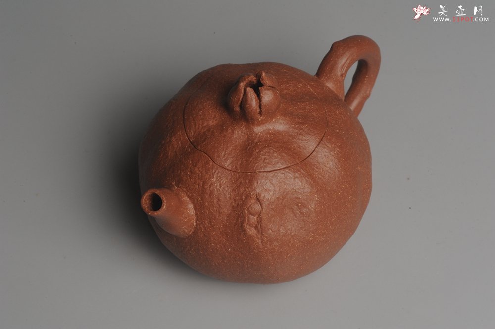 紫砂壶图片：美壶特惠 油润降坡泥精致卡盖全手工仿生石榴壶 - 美壶网