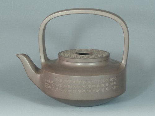 吴勇紫砂壶 玉璧提梁（木石刻） 