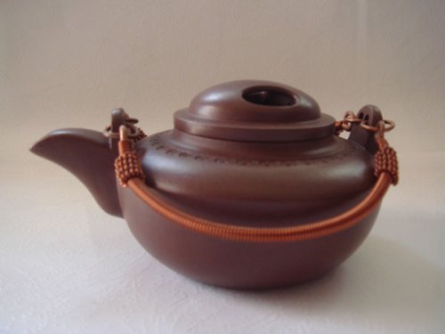 吴坤大紫砂壶 牛盖提梁 