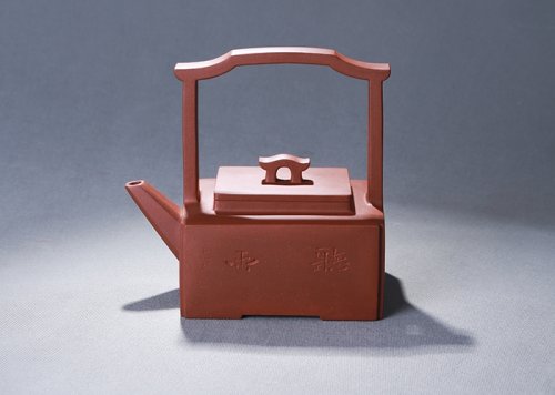 何震紫砂壶 明居提梁 