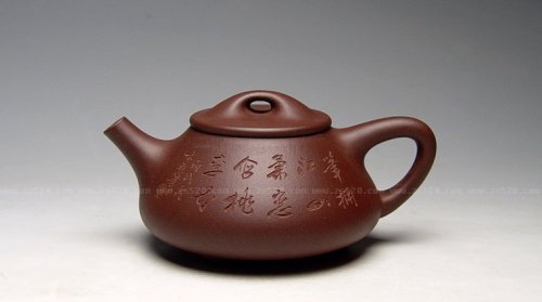 吴建平紫砂壶 全手工《石瓢》容量：320cc，家藏原矿底槽清，全手工鼎立制作，挺拔有力，韵味十足，吴建平代表作品， 