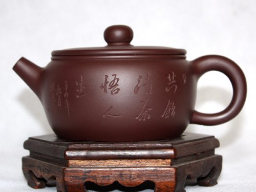 许艳萍紫砂壶 紫茄泥 圆鼓壶  售价6000元 